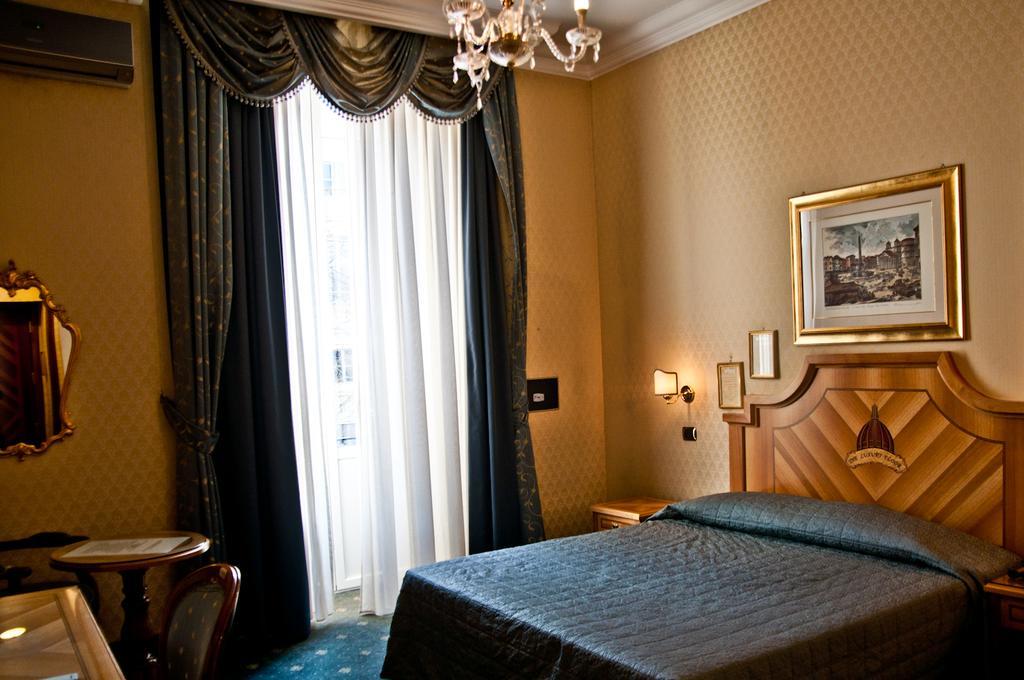 Les Chambres D'Or Rom Rum bild